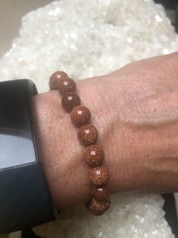 Armband van rood/bruine goudsteen 