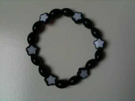 Armband met onyx en sterretjes